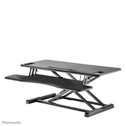 Neomounts by Newstar NS-WS300BLACK verwandelt eine Tischplatte in einen gesunden Sitz-Steh-Arbeitsplatz.